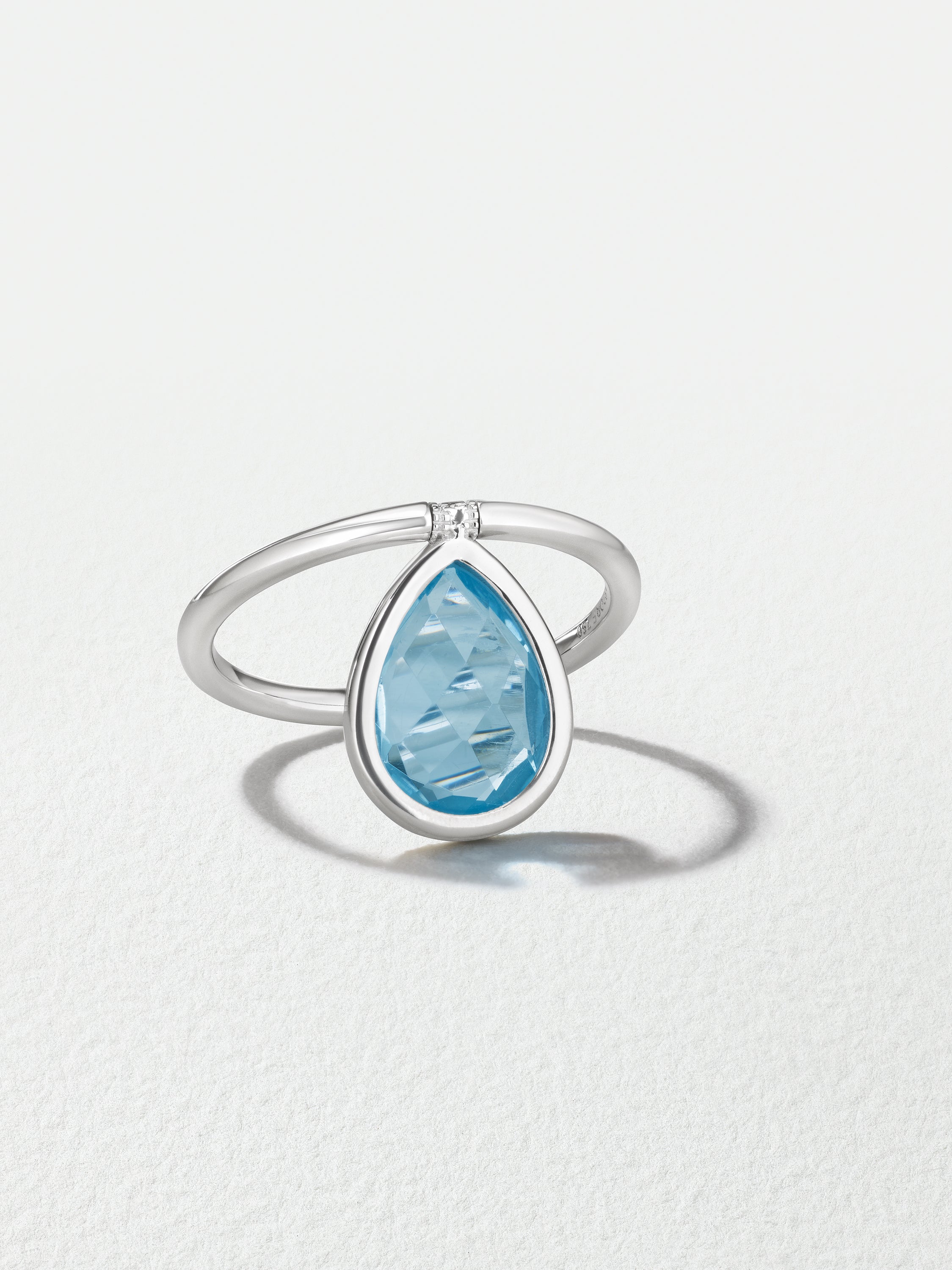 18K White Gold Blue Topaz Calla Flip Ring